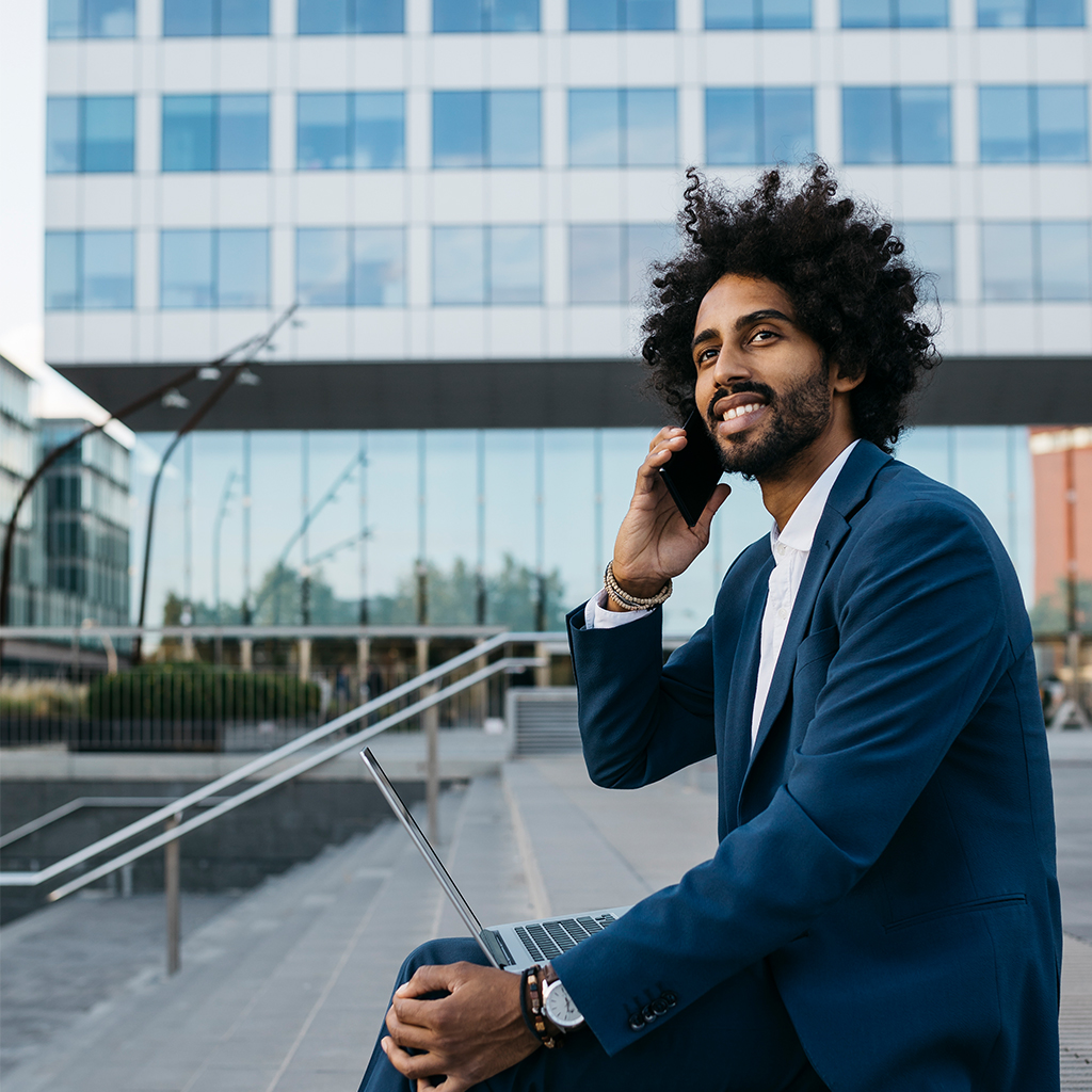 spain-barcelona-young-businessman-sitting-outdoo-2022-12-16-22-17-10-utc-2
